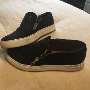 Report black slip on shoes